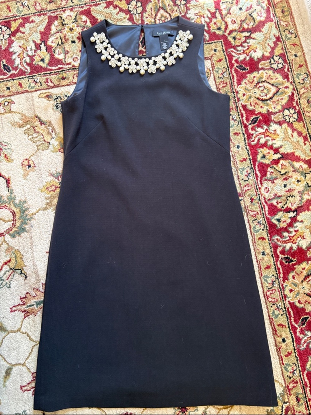 Black Sleeveless Jewel-Neck Mini Dress with Pearl Embellishment